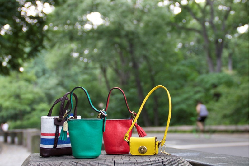 Illustration for article titled Coach Made a Lil' Tiny Leather Coach Bag for Barbie, and It's Only $95